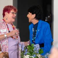 President Mantella talking with Bari Johnson